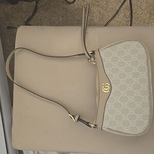 Beige and gold Gucci